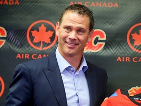 Calgary Flames asssistant GM Craig Conroy with Jaromir Jagr after the veteran forward signed a one-year contract with the team on Wednesday, October 4, 2017. Al Charest/Postmedia