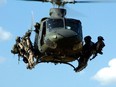 Canada Troops from the Canadian Special Operations Regiment (CSOR) prepare to rappel from a CH-146 Griffon helicopter during a training exercise near Kamloops, BC.