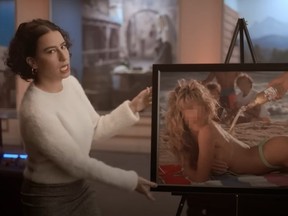 Ilana Glazer holds a framed photo of a woman in a bikini in a recent Miller Lite ad.
