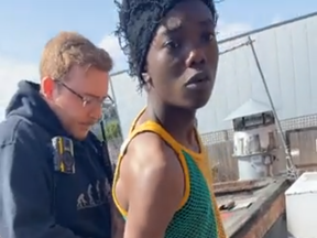 TikTok prankster Mizzy, right, getting arrested on May 26, 2023.
