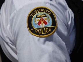 A Toronto Police logo is shown during a press conference in Toronto on Aug. 5, 2022.