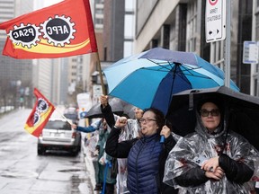 Public Service Alliance of Canada (PSAC) workers at the Canada Revenue Agency (CRA) strike in Montreal, Monday, May 1, 2023.