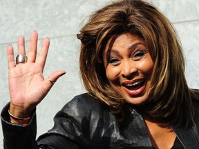 Tina Turner poses prior the Emporio Armani Fall-Winter 2011-2012 ready-to-wear collection on Feb. 26, 2011 during the women's fashion week in Milan.