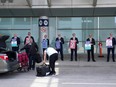 WestJet Airlines pilots stand on a picket line at Toronto's Pearson Airport on Monday May 8, 2023. WestJet CEO Alexis von Hoensbroech says a massive gap remains between the airline's offer to pilots and the union's counterproposal for a new contract as job action looms.