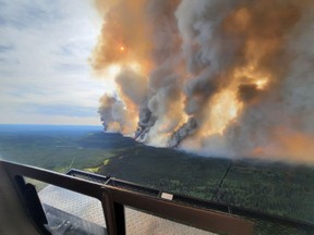 An aerial view of the Donnie Creek Complex fire in British Columbia is shown in this handout image provided by the BC Wildfire Service. The service says the blaze north of Fort St. John that has forced renewed evacuation orders and alerts has also grown significantly.