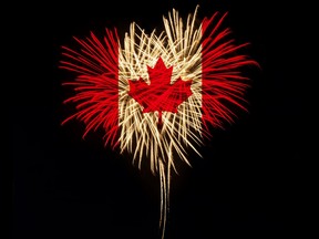 Fireworks in a heart shape with the Canada flag on a black background.