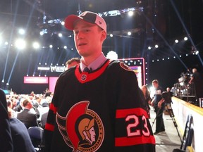 Hoyt Stanley celebrates after being selected 108th overall pick by the Ottawa Senators.