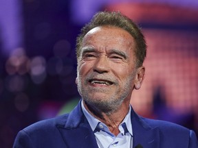 Arnold Schwarzenegger talks during a pre-show BMW keynote at CES 2023, Jan. 4, 2023, in Las Vegas.