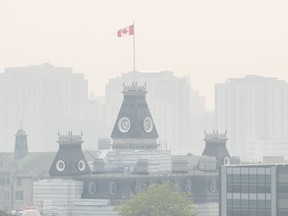 Smoke from wildfires burning across both Ontario and Quebec blanket the skyline in Kingston, Ont., Tuesday, June 6, 2023.