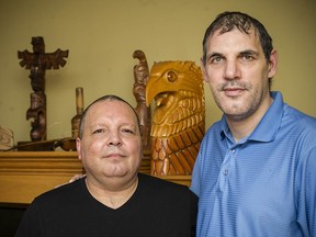 Former Vancouver Canuck Gino Odjick, right with friend Peter Leech at Leech's Burnaby home in 2015.