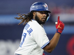 Blue Jays' Vladimir Guerrero Jr. celebrates his three-run home run against the Athletics during the third inning at the Rogers Centre in Toronto, Friday, June 23, 2023.