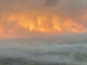 Helicopter pilot Kevin Burton took photos of wildfires between Chibougamau and the Mistissini Indigenous community in northern Quebec on June 5, 2023.
