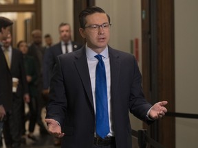 Conservative leader Pierre Poilievre speaks with reporters before the Standing Committee on Procedure and House Affairs on Parliament Hill, Tuesday, June 6, 2023 in Ottawa.