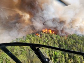 The Sudbury 17 wildfire (SUD017) burns east of Mississagi Provincial Park near Elliot Lake, Ont. in this Sunday, June 4, 2023 handout photo.