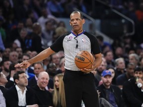Referee Eric Lewis gestures during Game 5 of the Eastern Conference semifinal on May 10, 2023, in New York.