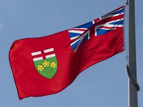 Ontario's provincial flag flies in Ottawa, Monday, July 6, 2020.