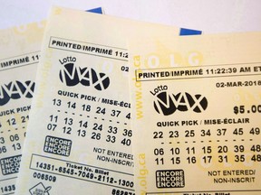 A Lotto Max ticket is shown in Toronto on Monday Feb. 26, 2018.