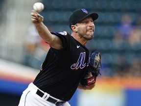 Max Scherzer of the New York Mets pitches during the first inning against the Washington Nationals.