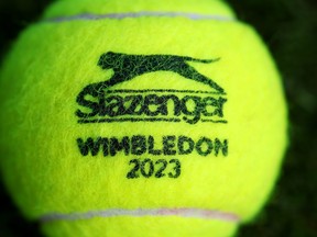 A detailed view of a Slazenger Wimbledon 2023 tennis ball is seen ahead of The Championships - Wimbledon 2023 at All England Lawn Tennis and Croquet Club on June 30, 2023 in London.