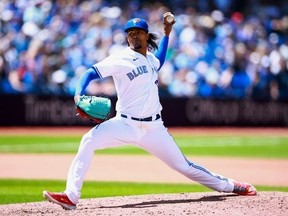 Genesis Cabrera of the Toronto Blue Jays pitches in the seventh inning against the Los Angeles Angels at Rogers Centre on July 30, 2023 in Toronto, Ontario, Canada.