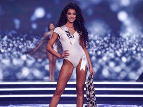 Miss Italy, Caterina Di Fuccia, presents herself on stage during the swimsuit competition of the preliminary stage of the 70th Miss Universe beauty pageant in Israel's southern Red Sea coastal city of Eilat on Dec. 10, 2021.