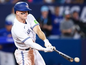 Blue Jays third baseman Matt Chapman hits an RBI double in the seventh inning against the Diamondbacks at Rogers Centre in Toronto, July 14, 2023.