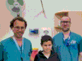 Drs. Ohad Einav and Ziv Asa with 12-year-old Suleiman Hassan (in middle) at Hadassah Medical Center following Hassan's recovery.