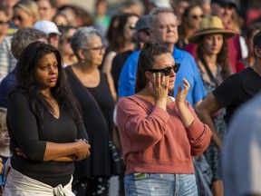 A public vigil is held for Karolina Huebner-Makurat at Jimmie Simpson Park on Queen St. E., near Carlaw Ave. in Toronto on Monday, July 17, 2023. Huebner-Makurat, a wife and mother, was killed by a stray bullet in Toronto's east end more than a week ago.