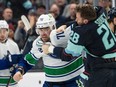 Carson Soucy and Tanner Pearson dropped the gloves during a spirited Jan.1 , 2022 contest in Seattle.