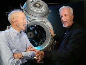 Oscar-winning director James Cameron, right, and his friend and childhood mentor Dr. Joe MacInnis were on hand at the Royal Canadian Geographical Society's opening of "PRESSURE: James Cameron Into the Abyss" exhibition Tuesday in Ottawa.
