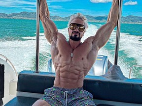 Bodybuilder Jo Lindner on boat.