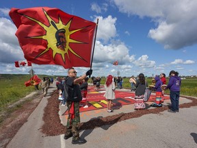 Indigenous leaders say a search of a Winnipeg-area landfill for the remains of women can be done safely and must go ahead. Activists blockade the main road into the Brady Road landfill, just outside of Winnipeg on Monday, July 10, 2023.