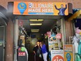 Women say their goodbyes at the storefront where the winning July 19-drawn lottery ticket was sold on July 20, 2023 in Los Angeles, Calif.