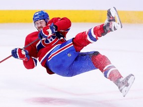 Jeff Petry loses his balance during overtime of a National Hockey League game against the Edmonton Oilers in Montreal Monday May 10, 2021.