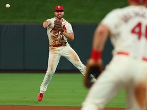 Paul DeJong of the St. Louis Cardinals throws to first base.
