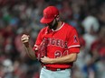 Lucas Giolito of the Los Angeles Angels looks on after allowing a two-run home run.