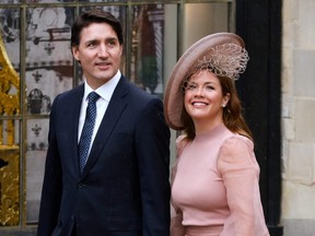 Canadian Prime Minister Justin Trudeau and his wife Sophie arrive at Westminster Abbey in central London on May 6, 2023, ahead of the coronations of King Charles III and Camilla, Queen Consort.