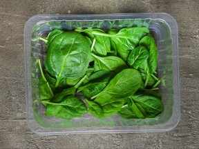 A container of spinach is pictured in this file photo.
