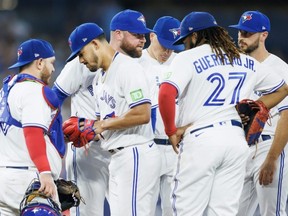 Blue Jays starting pitcher Jose Berrios is pulled out of the game by manager John Schneider in the fifth inning against the Cubs at Rogers Centre in Toronto, Friday, Aug. 11, 2023.