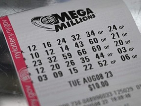 A Mega Millions lottery ticket in New York City on August 08, 2023. If won, it would be the largest prize awarded in the lottery's history at 1.58 billion USD, with a 757.2 million USD cash option.