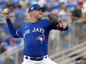 Toronto Blue Jays relief pitcher Trevor Richards delivers to the Minnesota Twins during the sixth inning of a spring training baseball game Wednesday, March 8, 2023, in Dunedin, Fla. Richards has been put on the Toronto Blue Jays' 15-day injured list with neck inflammation.