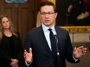 Conservative Leader Pierre Poilievre speaks to reporters in the foyer of the House of Commons on Parliament Hill in Ottawa on Sunday, June 11, 2023.