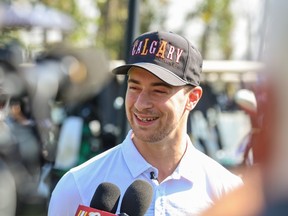 Calgary Flames winger Andrew Mangiapane talks with media before the start the Calgary Italian Open in support of Renfrew Educational Services at Cottonwood Golf & Country Club.