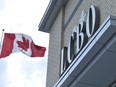 Paper bags will no longer be available at Liquor Control Board of Ontario stores starting Sept. 5. A&ampnbsp;Canadian flag flies near an under construction LCBO store in Bowmanville, Ont. on Saturday July 20, 2013.