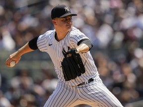 New York Yankees' Clarke Schmidt pitches during the first inning of a baseball game against the Boston Red Sox, Sunday, Aug. 20, 2023, in New York.