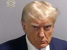 This handout image released by the Fulton County Sheriff's Office on August 24, 2023 shows the booking photo of former President Donald Trump.
