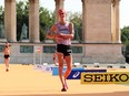 Evan Dunfee of Canada crosses the finish line in the Men's 35 Kilometres Race Walk Final during day six of the World Athletics Championships.