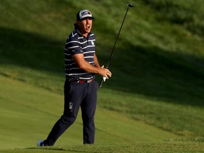 Brooks Koepka of Team United States plays a shot during the Friday afternoon fourball matches of the 2023 Ryder Cup.
