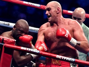 Britain's Tyson Fury fights against Britain's Derek Chisora during their WBC heavyweight title boxing match on December 3, 2022.