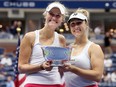 Gabriela Dabrowski (L) of Canada and partner Erin Routliffe of New Zealand celebrate after defeating Laura Siegemund of Germany and Vera Zvonareva of Russia in their Women's Doubles Final match on Day Fourteen of the 2023 US Open at the USTA Billie Jean King National Tennis Center on September 10, 2023 in the Flushing neighborhood of the Queens borough of New York City.